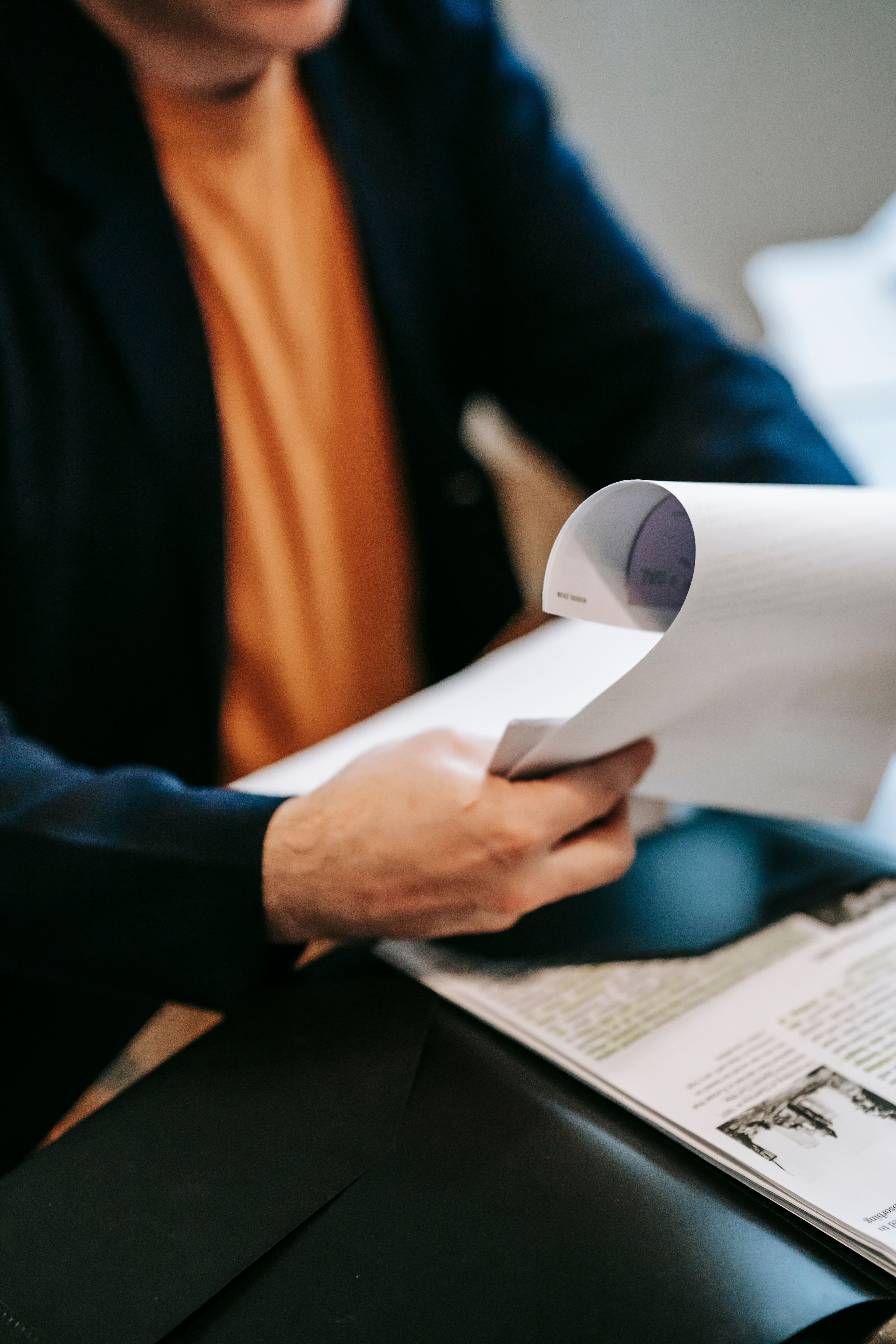 Independent reviewer evaluating printed project documentation
