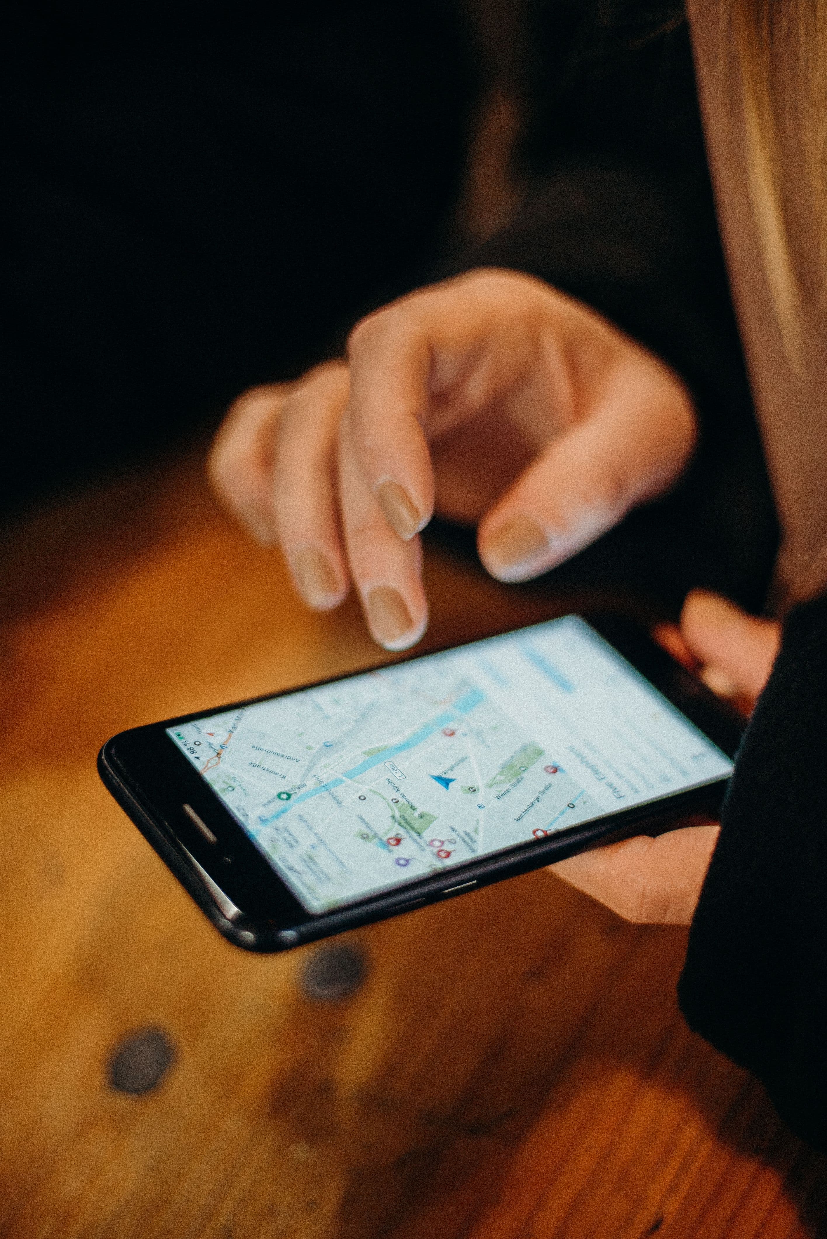 Person using a digital map on a mobile device
